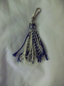 Blue tassel to be worn by Arctic explorers