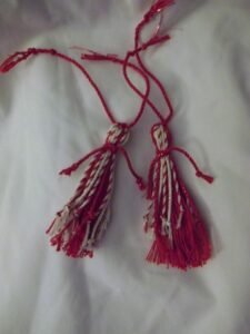 Red tassels bound for the Arctic